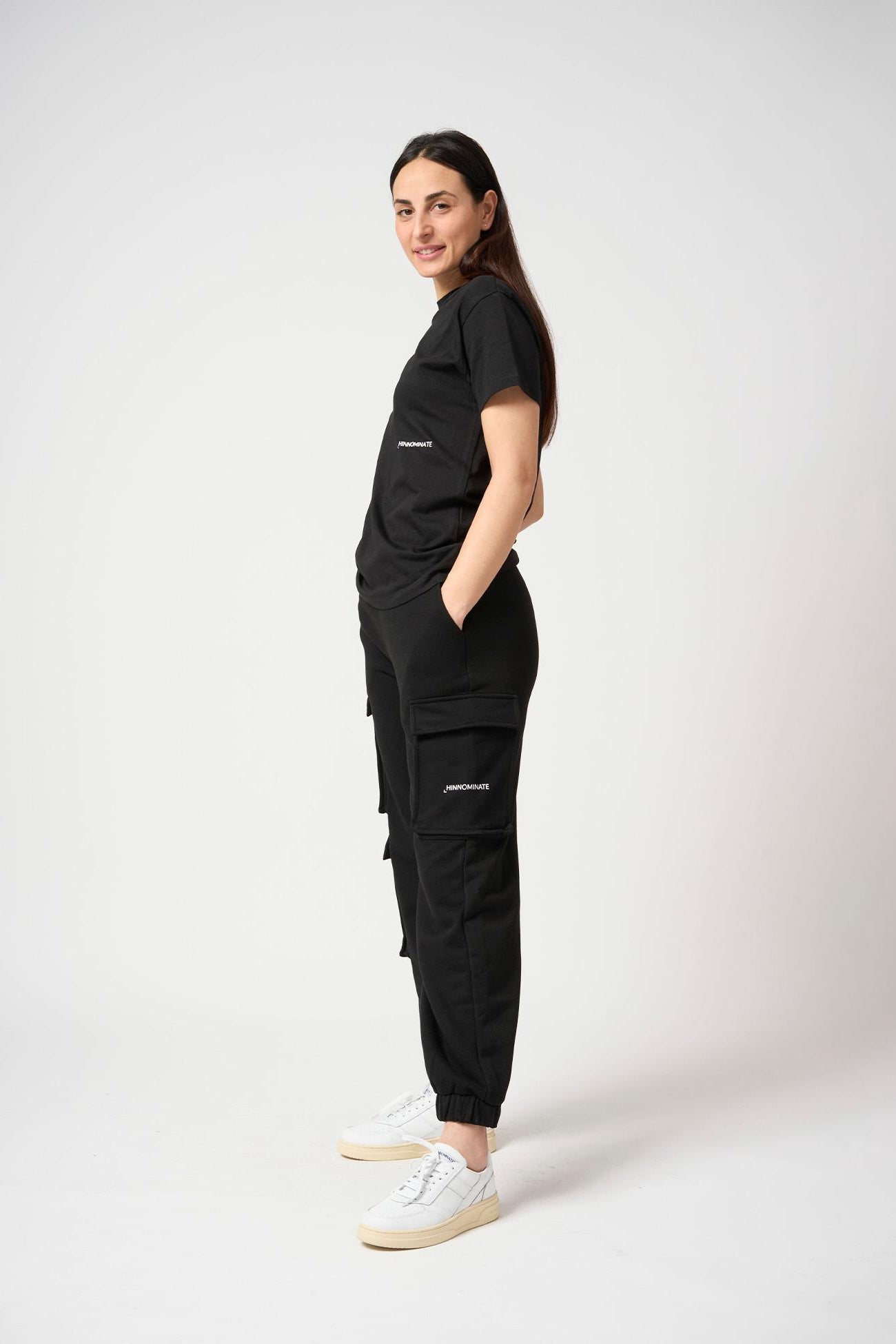 Pantalone con tasconi laterali