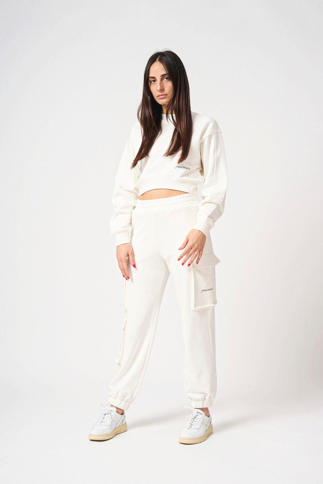 Pantalone con tasconi laterali