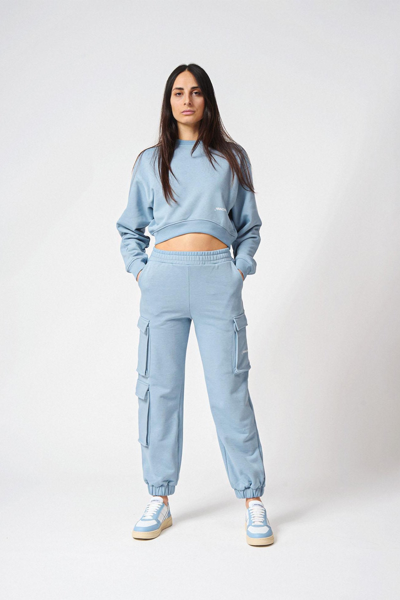 Pantalone con tasconi laterali