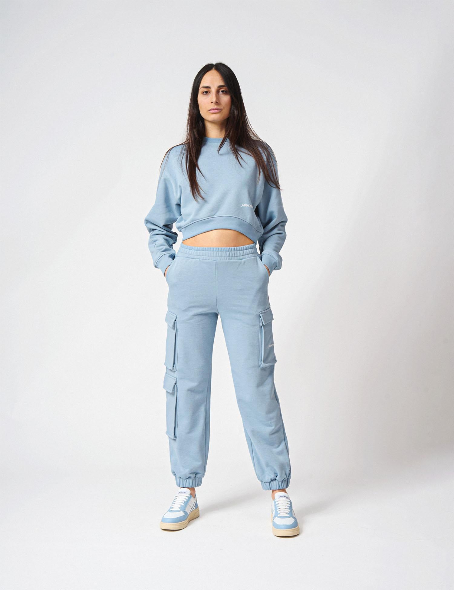 Pantalone con tasconi laterali