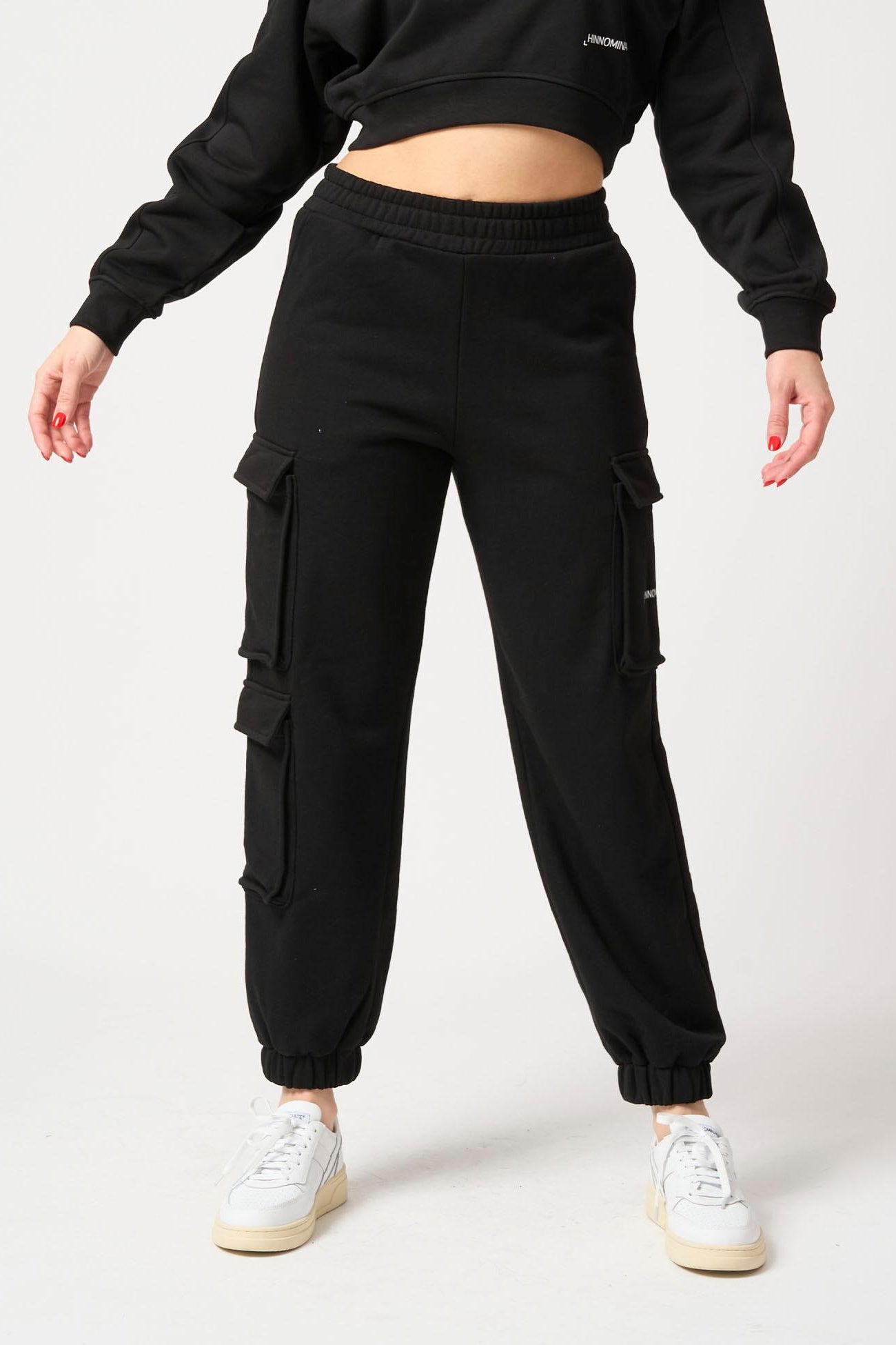 Pantalone con tasconi laterali