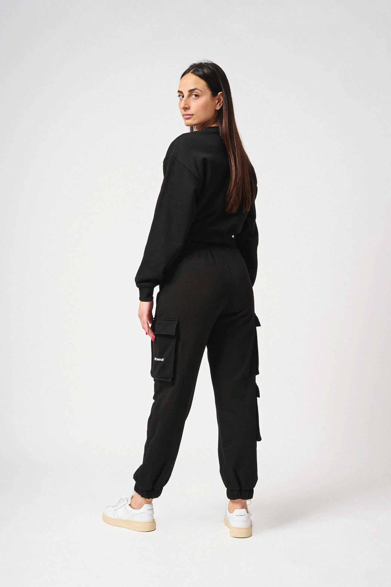 Pantalone con tasconi laterali