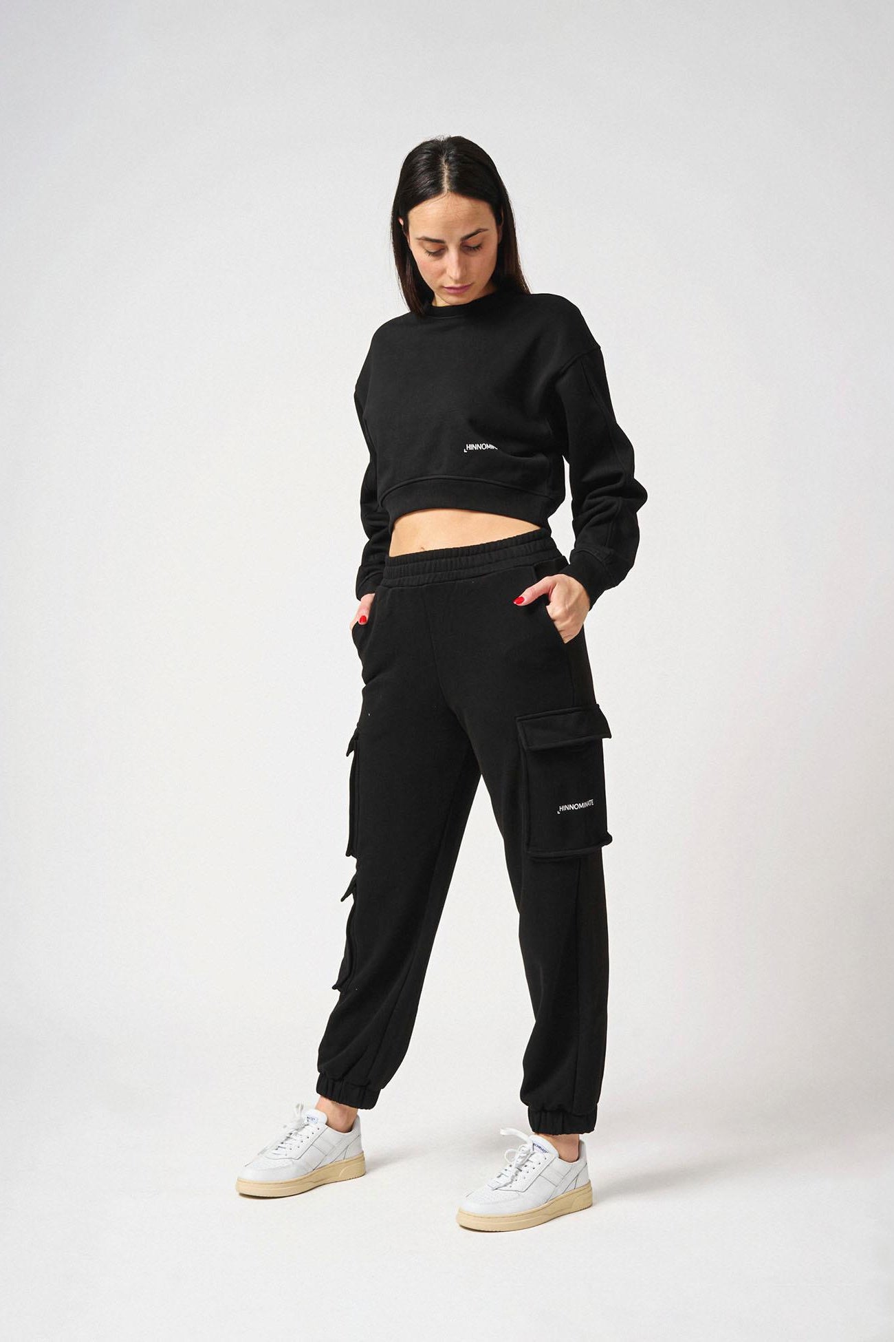 Pantalone con tasconi laterali