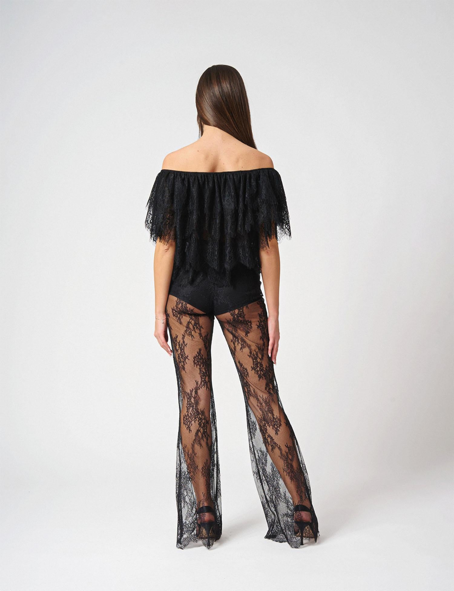 Pantalone in pizzo trasparente