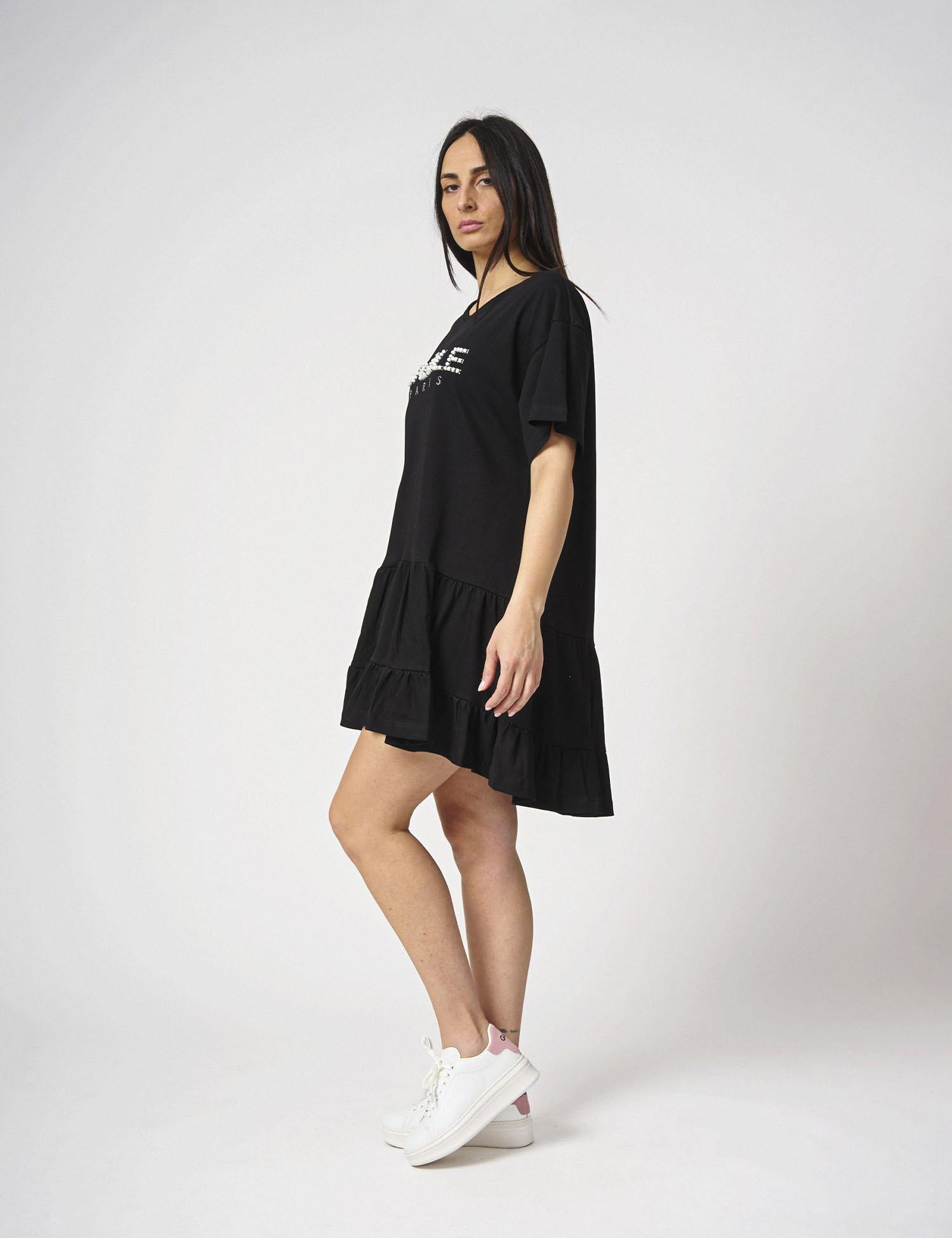 Abito lungo con balze