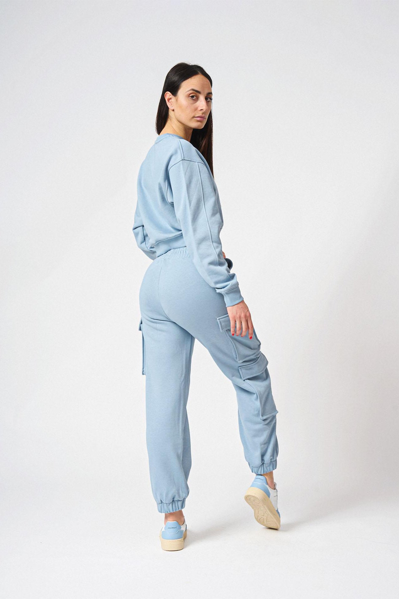 Pantalone con tasconi laterali