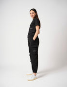 Pantalone con tasconi laterali