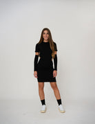 Abito corto con apertura sul retro