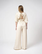 Top in raso maniche a pipistrello