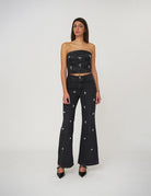 Top corto con applicazioni