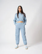 Pantalone con tasconi laterali