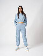 Pantalone con tasconi laterali