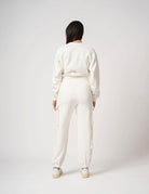 Pantalone con tasconi laterali