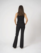 Top smanicato con bottoni