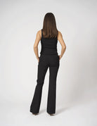 Top smanicato con bottoni