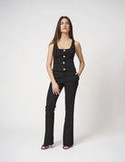 Top smanicato con bottoni