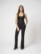 Top smanicato con bottoni