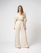 Top in raso maniche a pipistrello