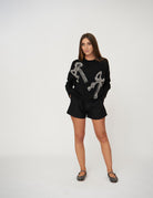 Maglia con fiocchi in strass