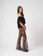 Pantalone in pizzo trasparente