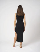 Abito a coste con bottoni